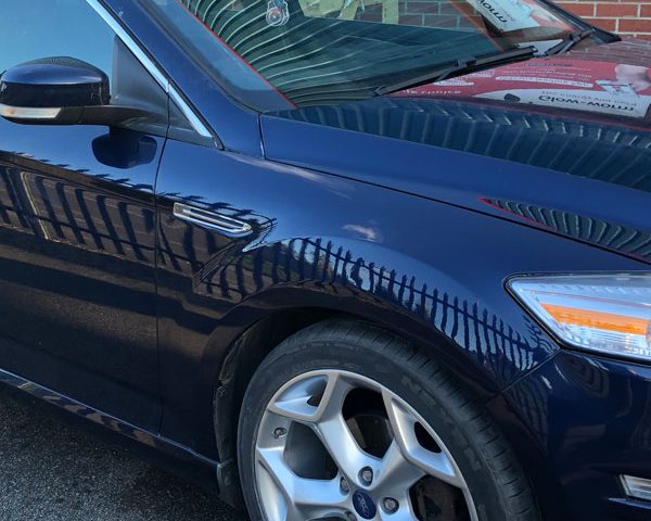 Blue car after mobile scratch and dent repair